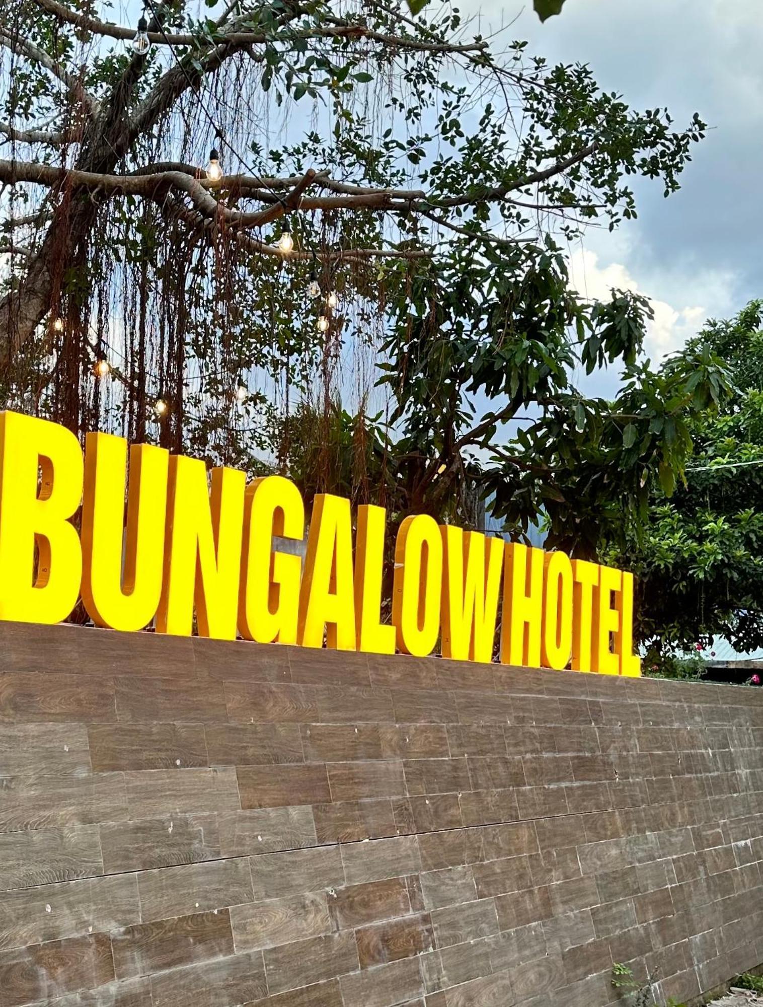 Bungalow Hotel Chi Khu Co Ong Bagian luar foto